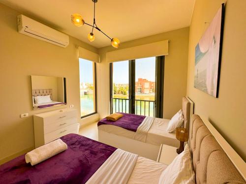 Giường trong phòng chung tại Luxury 3 bedrooms town house