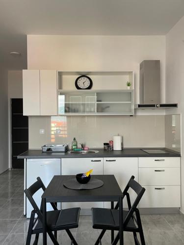 Η κουζίνα ή μικρή κουζίνα στο Grey apartment