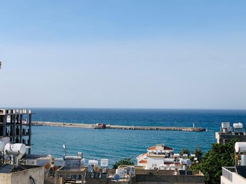 a view of a large body of water with a pier at North Residence Deniz Manzaralı Daire in Kérynia