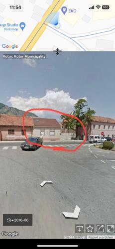 a picture of a car parked in a parking lot at Apartment ALEKSANDAR in Kotor