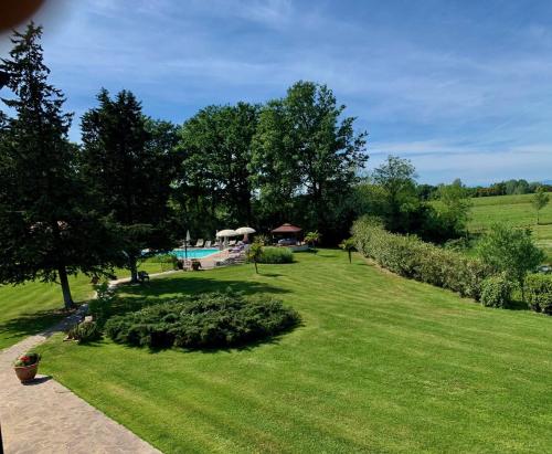 Piscine de l'établissement Podere il Giurato ou située à proximité