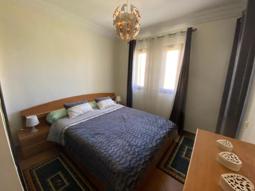 Una cama o camas en una habitación de CABO NEGRO - LILAC'S GARDEN - PISCINE - JARDIN - PARKING