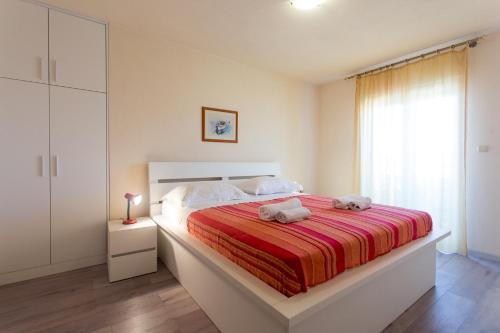 Ένα ή περισσότερα κρεβάτια σε δωμάτιο στο Apartment Gold