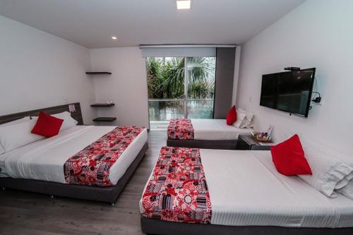 Una cama o camas en una habitación de Hotel Portal Del Norte