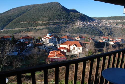 a view of a town with a mountain in the background at 2 Alonia in Anatolikí Frangísta