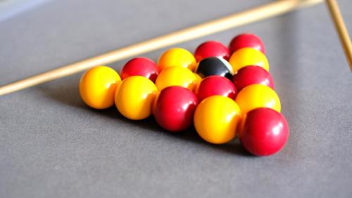 a group of balls on a billiard table at CITY HOTEL in Antananarivo