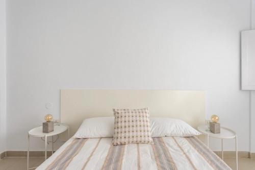Ένα ή περισσότερα κρεβάτια σε δωμάτιο στο Dúplex La Marea
