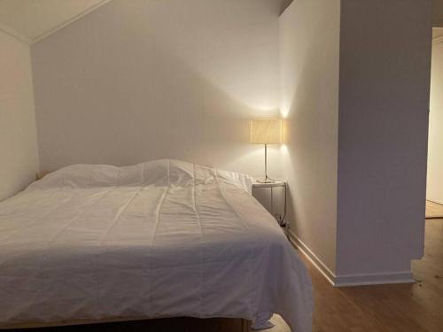 Łóżko lub łóżka w pokoju w obiekcie Great Apartment in central Härnösand