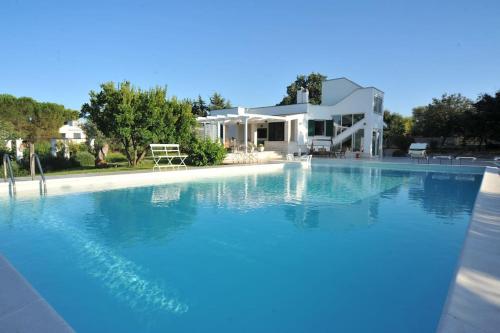 Foto CASA NEL VERDE CON GIARDINO E PISCINA PRIVATA 1