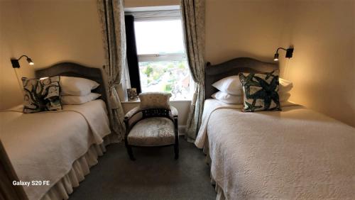 Katil atau katil-katil dalam bilik di Greylands Guest House