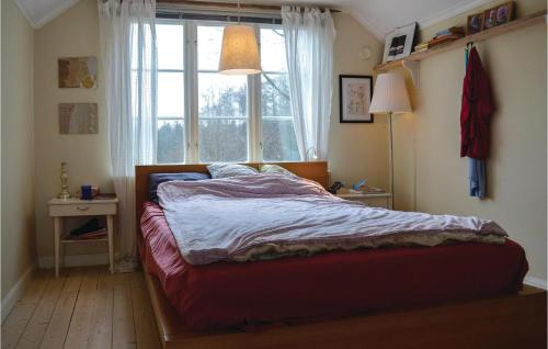 Postel nebo postele na pokoji v ubytování Stunning Home In Vegby With Kitchen