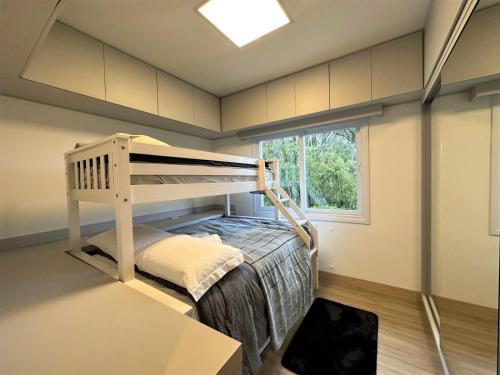 Katil atau katil-katil dalam bilik di Sofisticado apartamento 2D