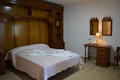 Säng eller sängar i ett rum på Nuevo Hotel Capitolio