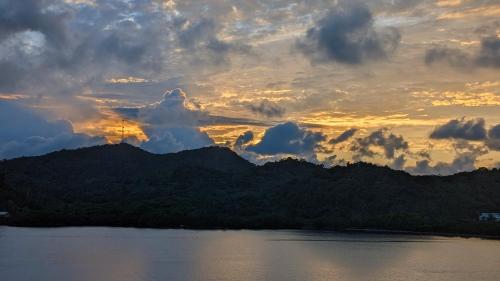 a view of a sunset over a body of water at El Palacio Rosa on Blue Lagoon 2BR Beachfront Suite on pristine & quiet bay w incredible views in Arrozal
