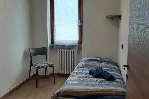 Postel nebo postele na pokoji v ubytování Cima Lago