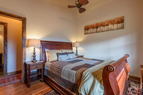 a bedroom with a bed and a ceiling fan at Hidden Gem in Banner Elk