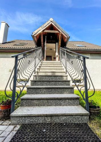 a set of stairs leading up to a house at Agroturystyka"u Piwowara" in Kłodzko