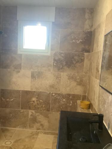 Kúpeľňa v ubytovaní Gites de Lyse avec Jacuzzi