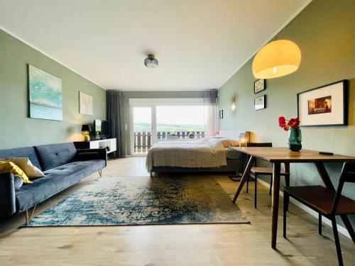 Ruang duduk di #2 Studioapartment mit Loreleyblick direkt an der schönsten Etappe des Rheinsteigs
