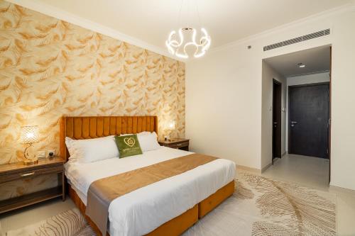 Ένα ή περισσότερα κρεβάτια σε δωμάτιο στο Amazing BeachFront Apartments near Atlantis Waterpark by Simply Comfort Sarai Palm Jumeirah