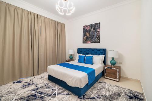 Ένα ή περισσότερα κρεβάτια σε δωμάτιο στο Amazing BeachFront Apartments near Atlantis Waterpark by Simply Comfort Sarai Palm Jumeirah