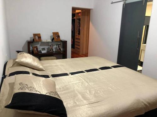 Cama ou camas em um quarto em Casa Branca