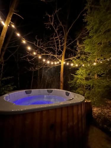 Φωτογραφία από το άλμπουμ του Odpoczynek Domki Pod Dębem z Opcją Jacuzzi σε Ćmińsk
