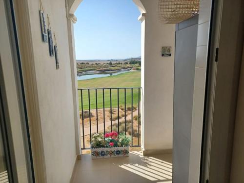 Ein Balkon oder eine Terrasse in der Unterkunft Penthouse Golf Hacienda Riquelme