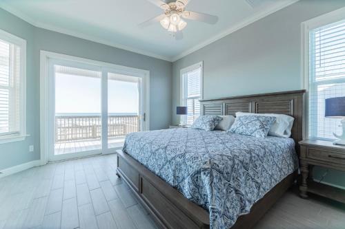 En eller flere senge i et værelse på Beachy Keen