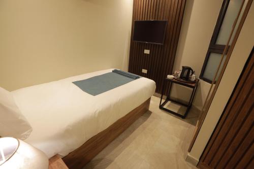 Postel nebo postele na pokoji v ubytování Pyramid Front Hotel