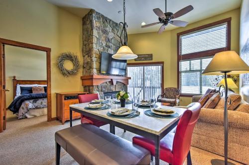 a living room with a dining room table and a couch at Ski-InandSki-Out Solitude Resort Condo with Mtn Views! in Solitude