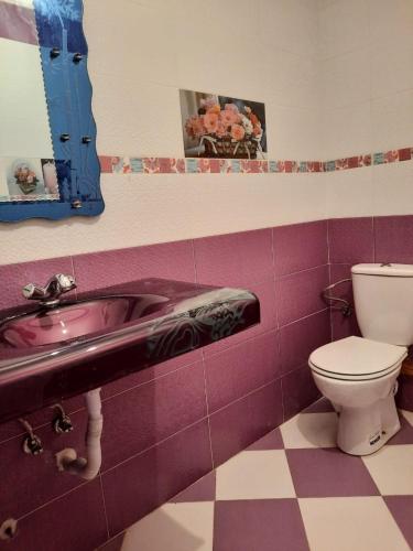 a bathroom with a sink and a toilet at JERDOUH For FAMILY ONLY in Tetouan