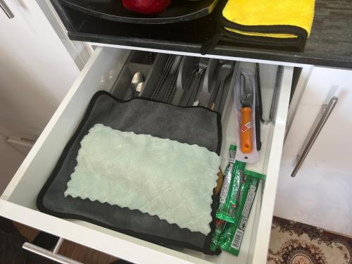 a drawer in a refrigerator filled with food at sea sand sun resort Executive 607 Mae Rumphueng beach in Rayong