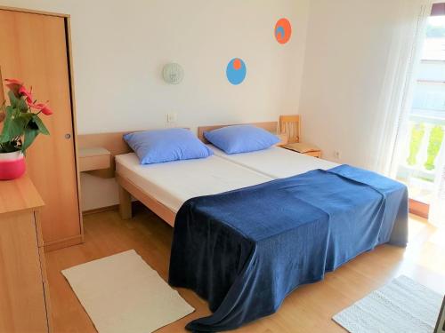 Apartments with parking space Palit, Rab - 14996