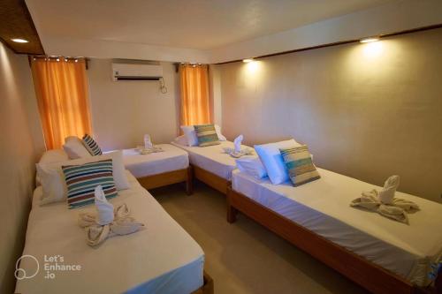 Postel nebo postele na pokoji v ubytování Amakan - El Nido Palawan
