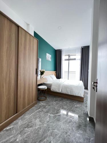 Ein Bett oder Betten in einem Zimmer der Unterkunft Su Apartment