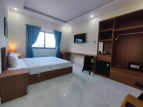 Postel nebo postele na pokoji v ubytování Hoàng Anh Côn Đảo Hotel