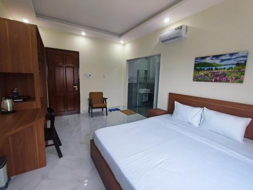 Postel nebo postele na pokoji v ubytování Hoàng Anh Côn Đảo Hotel