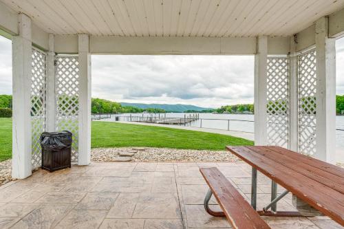 a pavilion with a bench and a view of the water at Lakefront Huddleston Condo with Community Pool in Huddleston