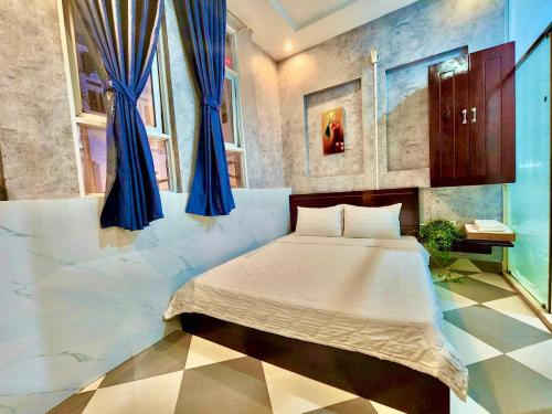 En eller flere senge i et værelse på MES HOTEL - Ngay Bến Ninh Kiều