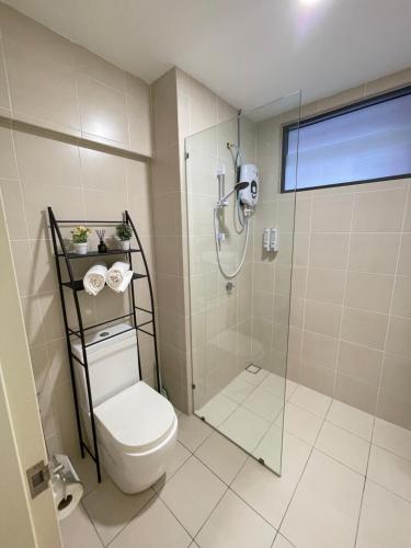 a bathroom with a shower and a toilet at Central of Sunway Town; 8 PAX in Petaling Jaya