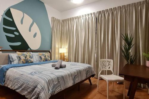 מיטה או מיטות בחדר ב-BOHO Geniehome 3BR free W-ifi @ Utropolis ShahAlam