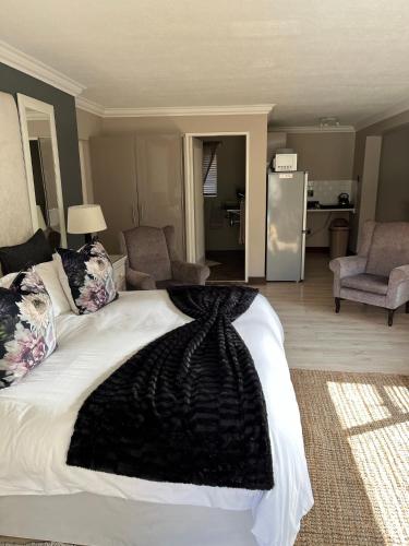 Ένα ή περισσότερα κρεβάτια σε δωμάτιο στο Annies Place Self Catering