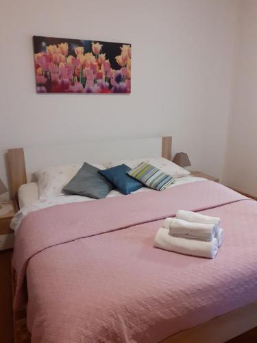 Postel nebo postele na pokoji v ubytování Apartments Novacic