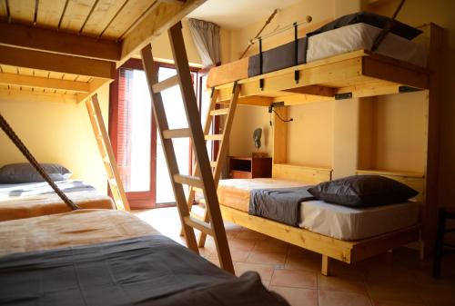 a bedroom with two bunk beds in a room at Crossroads in Thessaloniki