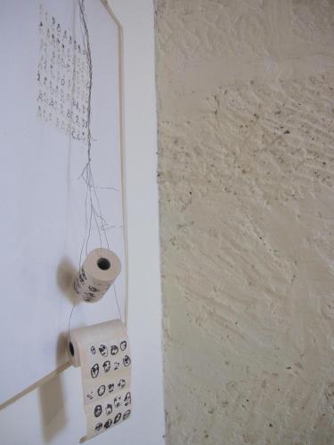 a remote control hanging on a wall next to a window at Brancadoria B&B in Monteleone Rocca Doria