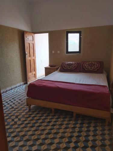 Katil atau katil-katil dalam bilik di kasbah Ait arbi