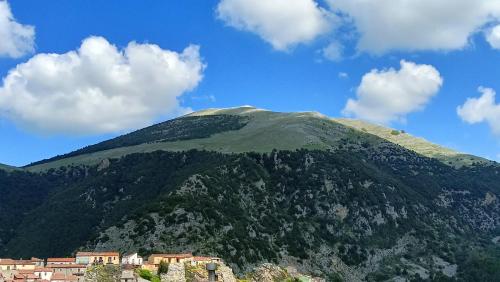 a mountain with houses on top of it at B&b da Teresa in Castelsaraceno