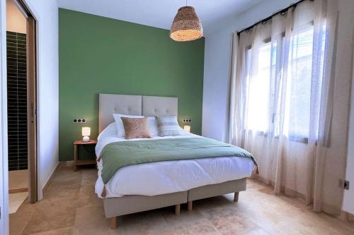 Posteľ alebo postele v izbe v ubytovaní appartement 4/5 personnes des Logis de Cocagne, The green