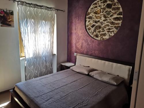 Ένα ή περισσότερα κρεβάτια σε δωμάτιο στο La Casa di Thor